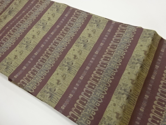 横段に動物・抽象模様織出し名古屋帯